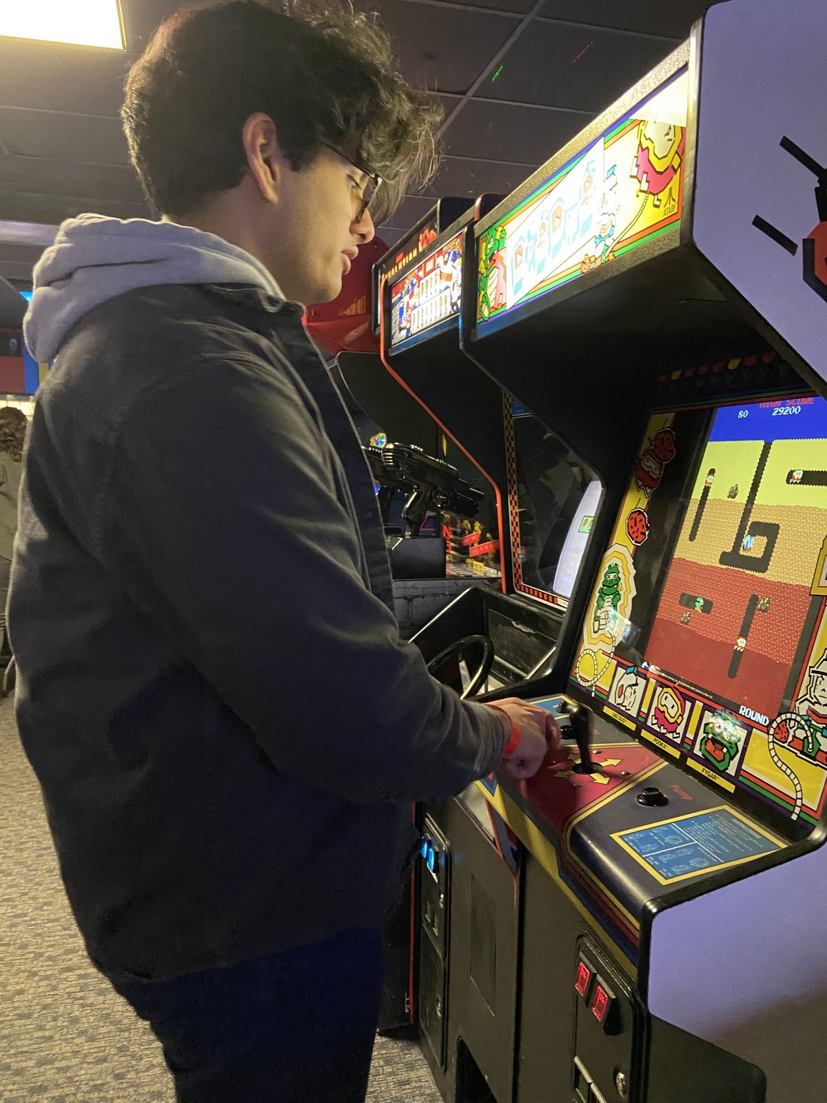 Me playing a game at the arcade
